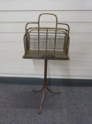 A 19th / early 20thC brass music stand / pedestal magazine rack impressed WT & Co to base H84cm