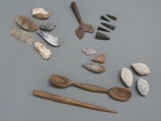 A small collection of archaeological finds to include neolithic flint arrow heads,