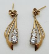 A pair of 9ct gold earrings,