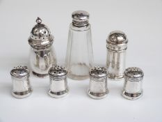 Two hallmarked silver peppers,