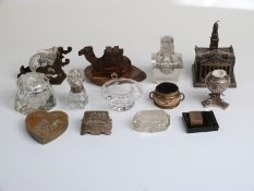 Collection of inkwells including glass Bonzo dog, novelty camel,