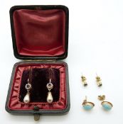 A pair of gold earrings set with paste surrounded by faux pearls in original box,