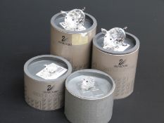 Four Swarovksi Crystal Pigs, largest 6cm long,