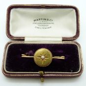 Victorian yellow metal brooch set with seed pearls, in original Martin and Co box, 3.81g, 3.7 x 1.