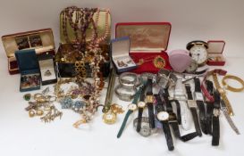A collection of jewellery including silver earrings, watches, two silver rings, silver bracelet,