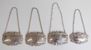 Four modern hallmarked silver bottle tickets comprising whisky, vodka, gin and sherry,