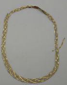 A bi-coloured 9ct gold necklace, 5.