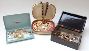 A collection of costume jewellery to include ivory beads, mother of pearl necklace, brooches,