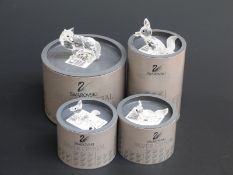 Four Swarovksi Crystal Foxes, largest 6cm long,