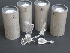 Four Swarovski Crystal cut glass instruments Harp, Saxophone, Cello and Mandolin, largest 6.