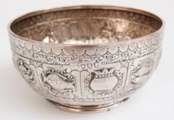 A Victorian hallmarked silver pedestal bowl repoussé decorated in the Indian or Burmese style,