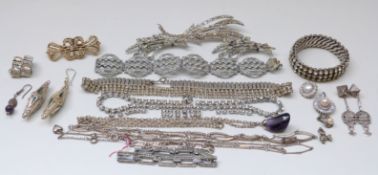 A collection of paste jewellery including brooches, necklaces, bracelets,