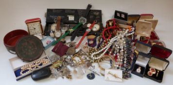 A collection of costume jewellery including beads, pocket watches, watches, brooches,