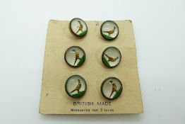 A set of six reverse painted buttons decorated with pheasants