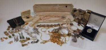 A collection of costume jewellery to include beads, earrings including Swarovski and silver,