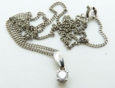 An 18 ct white gold pendant set with a modern round brilliant cut diamond of approximately 0.
