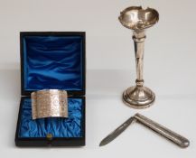 Cased hallmarked silver napkin ring 31g, folding fruit knife and hallmarked silver vase.
