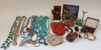 A collection of costume jewellery to include agate necklaces, white metal bangle,