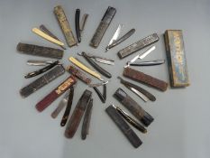 Collection of cut throat razors including Wilkinson, Butler,