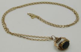 A 9ct gold swivel fob set with agate on a 9ct gold chain, 11.