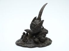 Bronze study of a bird with chicks, signed to base possibly Velavan,
