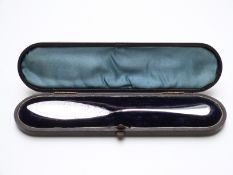 A cased Victorian hallmarked silver butter knife, Sheffiled 1858 maker Henry Atkin, length 20cm,