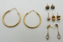 A pair of 18ct gold earrings, 4.