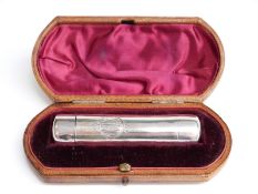 A cased Victorian hallmarked silver double ended scent bottle and vinaigrette with gilt interior,