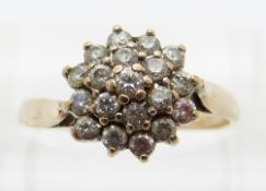 A 9ct gold ring set with paste in a cluster,