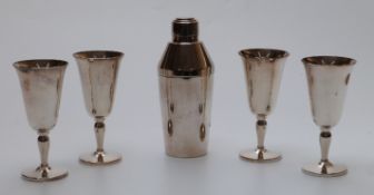 Elkington & Co cocktail shaker and four silver plated goblets