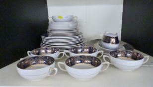 Wood & Co Castille pattern six place dinner service on retro rack