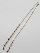 A 9ct gold necklace, 2.