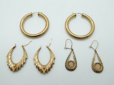 Two pairs of 9ct gold hoop earrings and another pair of 9ct gold earrings set with small coins, 10.
