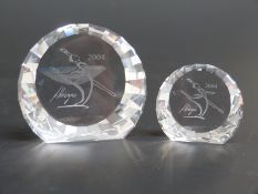 A pair of Swarovski Crystal cut glass signed special event paperweights Antonio,