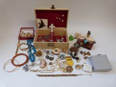 A collection of costume jewellery including rings, gold plated chains, abalone brooch,
