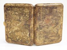Japanese cigarette case with engraved gilt decoration, the front decorated with a landscape,