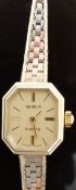 Swiss made 9ct gold ladies wristwatch with gold hands, baton markers, octagonal case and ETA 578.