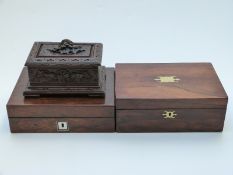 Two rosewood boxes and a carved Black Forest box,