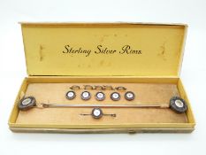 A boxed set of hat pins,