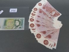 Fifteen consecutive ten shilling notes and a £1 example,