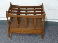 Mahogany three division Canterbury on brass castors W54cm