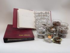 An amateur collection of mostly UK coinage, comprising two albums and categorised containers,