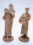 Royal Worcester pair of blush ivory water carrier figures, shape nos 1250 &1252,