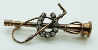 A late Victorian brooch in the form of a horn,