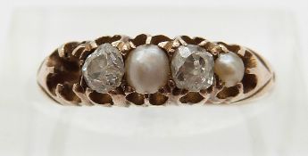 Victorian ring set with two old cut diamonds and two pearls,