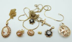 A 9ct gold cross, two 9ct gold pendants set with a diamond and sapphires, a 9ct gold Maltese cross,