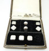 A cased set of platinum dress set comprising cufflinks, collar studs & buttons, 20.