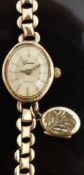 Ladies 9ct gold wristwatch with gold hands, baton markers and face and quartz movement,