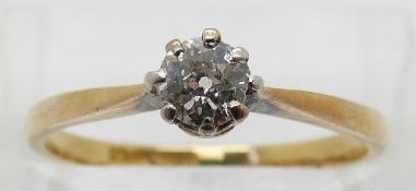An 18ct gold ring set with an old cut diamond of approximately 0.