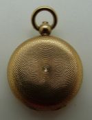 A yellow metal Victorian locket with engine turned decoration, 5.
